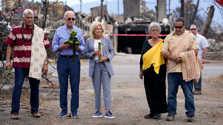 President Joe Biden and First Lady Jill Biden participate in a blessing ceremony with Lahaina elders in Mokuʻula while visiting areas devastated by the Maui wildfires Monday, August 21, 2023, in Lahaina, Hawaii.  (AP Photo/Evan Vucci)