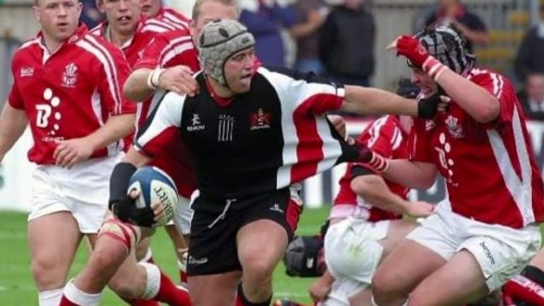 Former Wales international Lenny Woodward (centre) who was diagnosed with early onset dementia, says the rule change should be tested by top-flight players first 