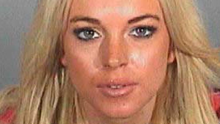 Actress Lindsay Lohan is pictured in this booking photograph released November 15, 2007 by the Los Angeles County Sheriff&#39;s Department. Lohan checked in and out of jail on Thursday, spending just 84 minutes behind bars for a drunken driving and cocaine-possession conviction, Los Angeles police said. REUTERS/Los Angeles County Sheriff Dept./Handout (UNITED STATES). EDITORIAL USE ONLY. NOT FOR SALE FOR MARKETING OR ADVERTISING CAMPAIGNS.
