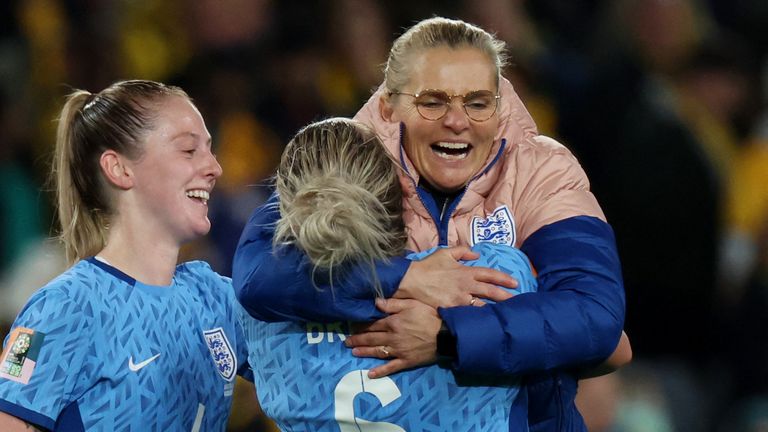 England boss Sarina Wiegman is lifted into the air by Lionesses captain Millie Bright