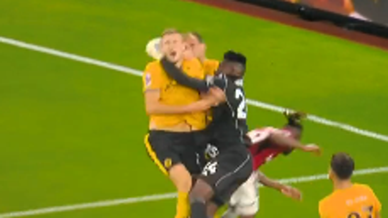 Manchester United goalkeeper Andre Onana clashes with two Wolves players during his side&#39;s 1-0 victory at Old Trafford. Pic: Sky Sports News