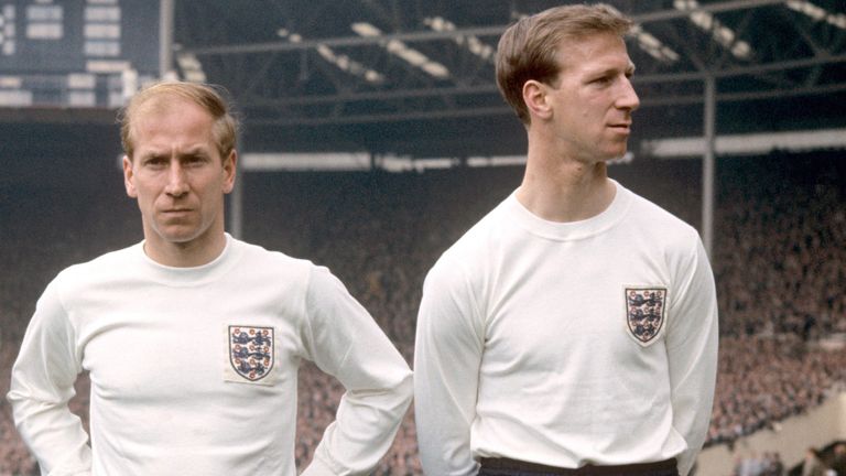 Brothers Bobby Charlton of Manchester United and and Jackie Charlton of Leeds United (right) on the field at Wembley Stadium, where both were in the England team which drew 2-2 with Scotland. The player on the left is centre forward Barry Bridges.