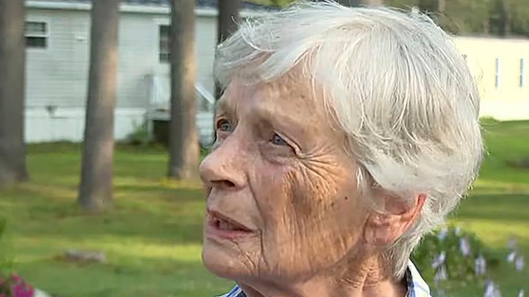 Marjorie Perkins speaks to a reporter Wednesday, Aug. 2, 2023, at her home in Brunswick, Maine. Perkins, 87, was left bruised after police said a teenager broke into her home and attacked her. She fought off the intruder and gave him food before he fled. (News Center Maine via AP)