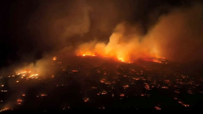 An aerial view of a wildfire in Kihei, Maui County, Hawaii, U.S., August 8, 2023 in this screen grab obtained from a social media video. Clint Hansen of Maui Real Estate Radio/TMX via REUTERS THIS IMAGE HAS BEEN SUPPLIED BY A THIRD PARTY. MANDATORY CREDIT. NO RESALES. NO ARCHIVES.
