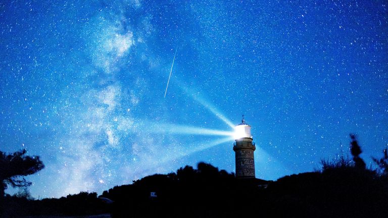 A meteor streaks in the night sky during the annual Perseid meteor shower on the island of Lastovo, Croatia August 12, 2023. REUTERS/Antonio Bronic     TPX IMAGES OF THE DAY     