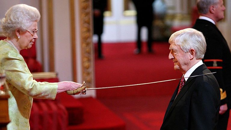 File photo dated 04/06/2008 of Sir Michael Parkinson receiving his Knighthood from Queen Elizabeth II at Buckingham Palace in London. Sir Parkinson has died at the age of 88. Issue date: Thursday August 17, 2023.