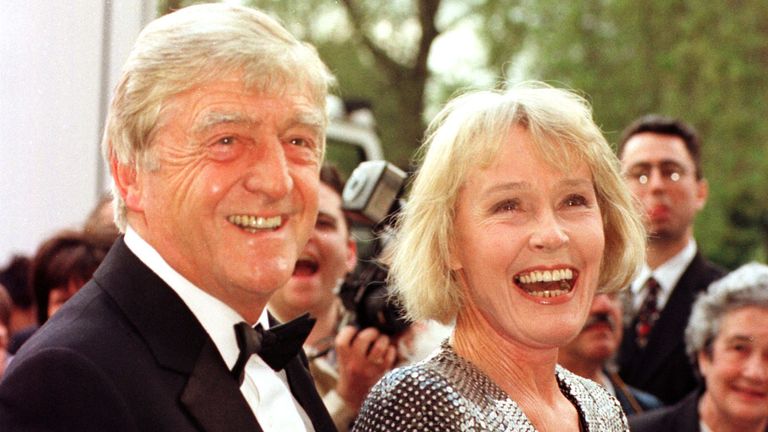 TV chat show host Michael Parkinson arrives with his wife Mary at the Royal Albert Hall for the BAFTA Award ceremony.