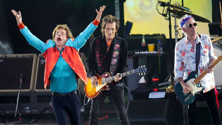 Mick Jagger, left, Ronnie Wood, center, and Keith Richards, right, of the band &#39;The Rolling Stones&#39; perform onstage during the last concert of their &#39;Sixty&#39; European tour in Berlin, Germany, Wednesday, Aug. 3, 2022. (AP Photo/Michael Sohn)
