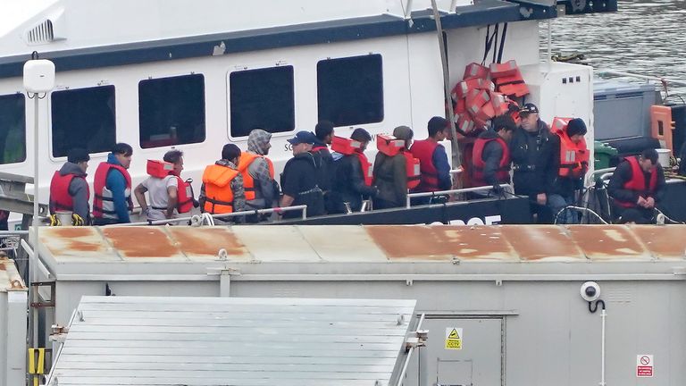 A group of people thought to be migrants are brought into Dover from a Border Force vessel. File pic