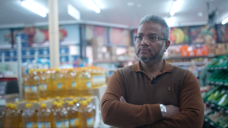Moin Uddin Khan, who owns the large Al-Falah Supermarket in Bradford, says people are always coming in asking for work - predominantly people who have come on skilled worker visas.