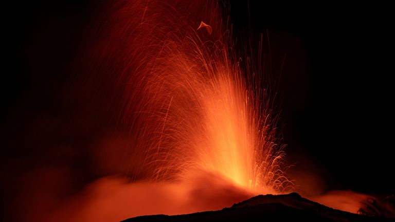 Mount Etna, Europe&#39;s most active volcano, lights up the night sky with eruptions as seen from Rocca Della Valle, Italy, August 13, 2023. Etna Walk/Marco Restivo/ Handout via REUTERS ATTENTION EDITORS - THIS IMAGE HAS BEEN SUPPLIED BY A THIRD PARTY. TPX IMAGES OF THE DAY
