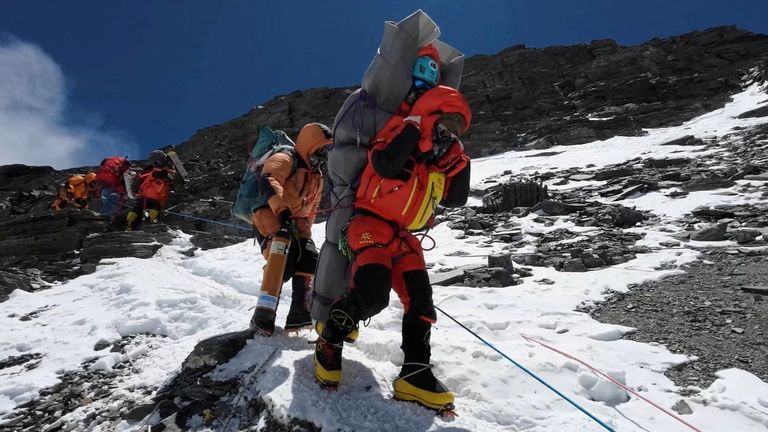 A sherpa rescues a climber from Mount Everest&#39;s &#39;death zone&#39; in May. File pic: Reuters