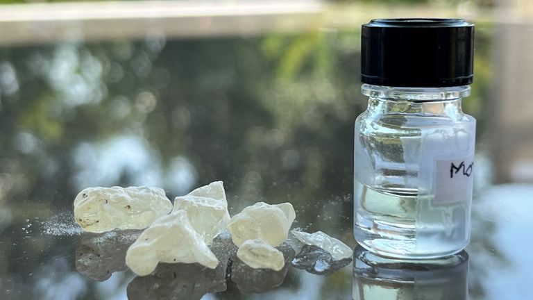 Dammar resin, an ingredient in embalming, next to a bottle of the ancient scent recreated by perfumer Carole Calvez based on scientific analyses