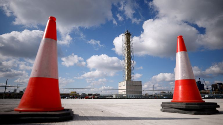 FILE PHOTO: The new remote control tower is seen between traffic cones at London City Airport, Britain, April 29, 2021. REUTERS/John Sibley/File Photo