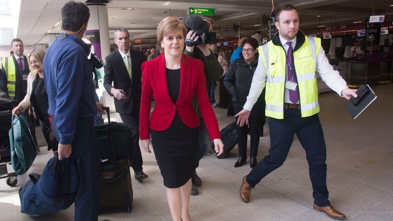 SNP leader Nicola Sturgeon arrives at Edinburgh Airport before flying to London.