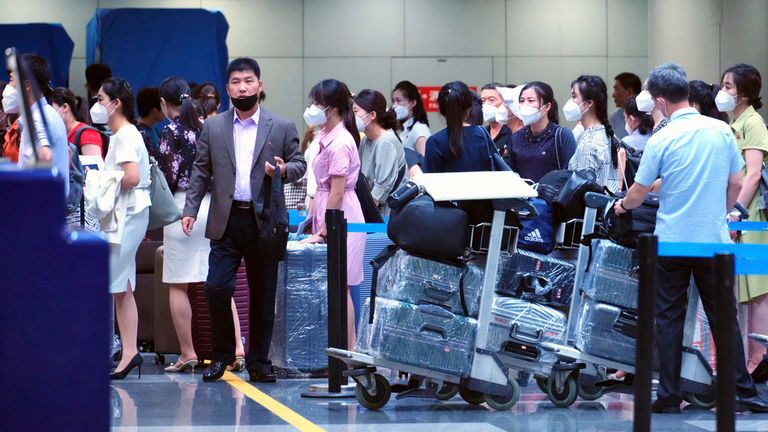 People line to check-in a flight of Air Koryo for Pyongyang, North Korea at Beijing Capital International Airport in Beijing on August 26, 2023. ( The Yomiuri Shimbun via AP Images )