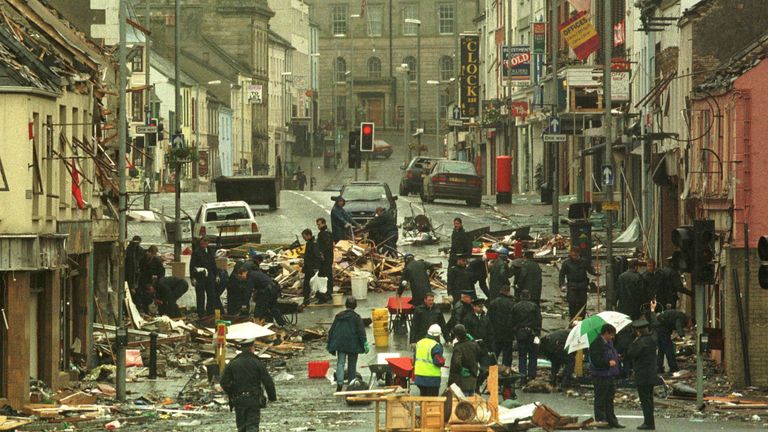 RUC officers look at the debris Sunday, August 16, 1998, following yesterday&#39;s bomb in Omagh town centre. The bomb exploded Saturday afternoon killing 28 people and injuring a further 220. (AP Photo/Alastair Grant).
