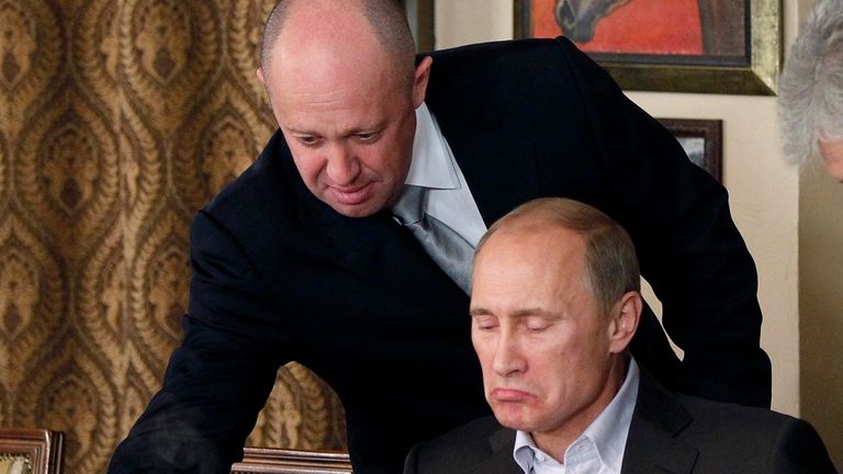 Yevgeny Prigozhin and Vladimir Putin in 2011. Pic: AP