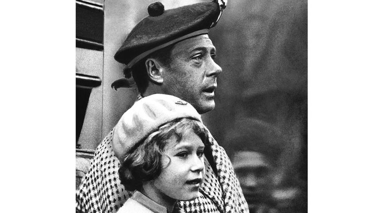 Queen Elizabeth II, when she was a princess, with her uncle, Edward VIII, when he was Prince Edward, during a visit to Balmoral in 1933. Pic: AP