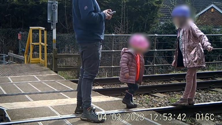 Footage shows parents letting their toddlers play on live railway lines, youths doing one-armed press-ups and dog walkers sitting their pets on the tracks for photos