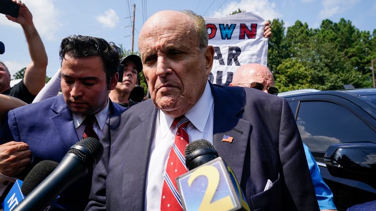 Rudy Giuliani speaks outside the Fulton County jail, Wednesday, Aug. 23, 2023, in Atlanta. Giuliani has surrendered to authorities in Georgia to face an indictment alleging he acted as former President Donald Trump...s chief co-conspirator in a plot to subvert the 2020 election. (AP Photo/Brynn Anderson)