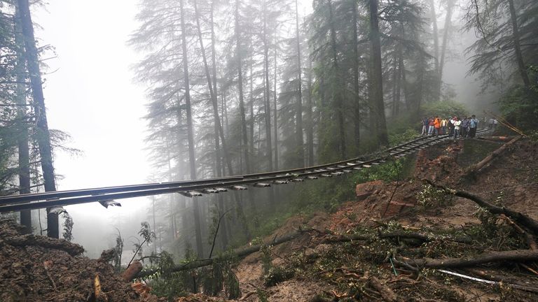 A portion of the Shimla-Kalka heritage railway track that got washed away following heavy rainfall on the outskirts of Shimla, Himachal Pradesh state, Monday, Aug.14, 2023. Heavy monsoon rains triggered floods and landslides in India&#39;s Himalayan region, leaving more than a dozen people dead and many others trapped, officials said Monday. (AP Photo/ Pradeep Kumar)