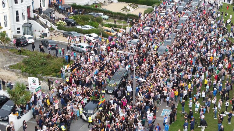 Fans of singer Sinead O&#39;Connor line the streets for a "last goodbye" to the Irish singer as her funeral cortege passes through her former hometown of Bray, Co Wicklow, ahead of a private burial service. Picture date: Tuesday August 8, 2023. PA Photo. Grammy-winning O&#39;Connor, 56, was found unresponsive by police at her south-east London home on July 26. See PA story FUNERAL OConnor. Photo credit should read: Niall Carson/PA Wire