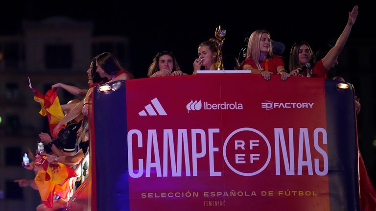 Spain&#39;s Women&#39;s World Cup soccer team celebrate on top of bus as they arrive in Madrid, Spain, Monday, Aug. 21, 2023. Spain beat England in Sydney Sunday to win the Women&#39;s World Cup soccer final. (AP Photo/Manu Fernandez)