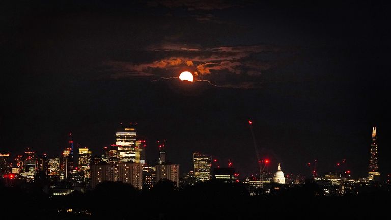The super blue moon over the city of London seen from Primrose Hill