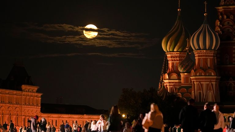 The super blue moon behind St Basil&#39;s Cathedral in Red Square in Moscow, Russia. Pic: AP