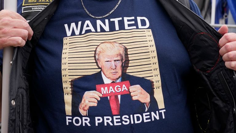 A supporter of ex-president Donald Trump outside court in Washington D.C.