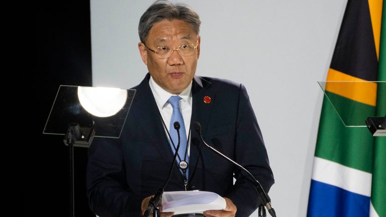 Wang Wentao reads out Xi Jinping&#39;s speech. Pic: AP