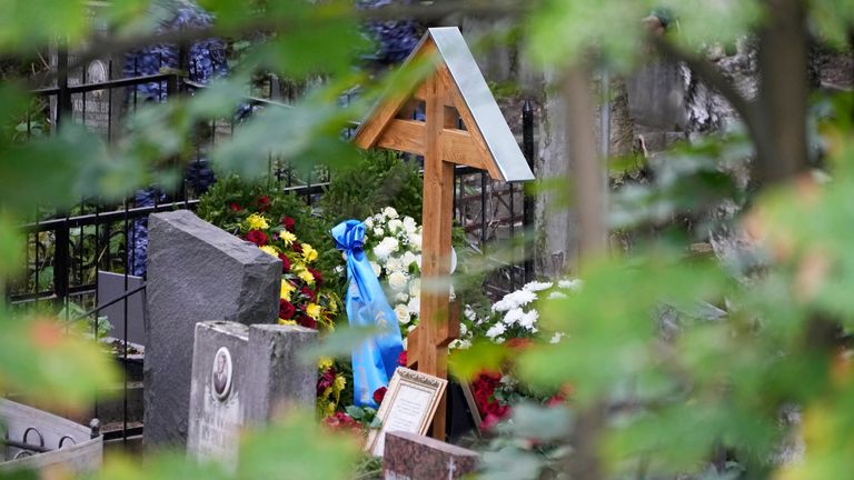 Flowers are seen on Yevgeny Prigozhin&#39;s grave after a funeral at the Porokhovskoye cemetery. Pic: AP