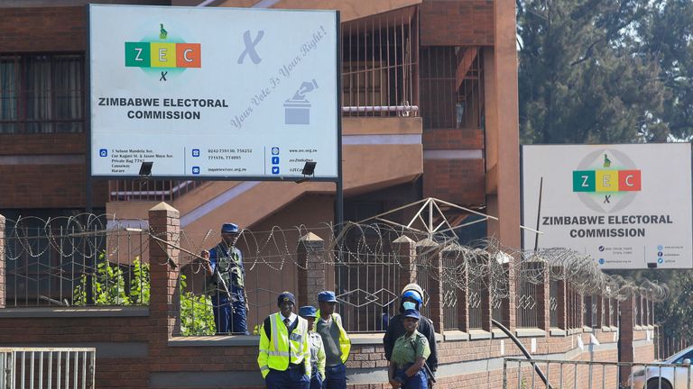 Armed police outside Zimbabwe&#39;s Electoral Commission building in Harare. Pic: AP