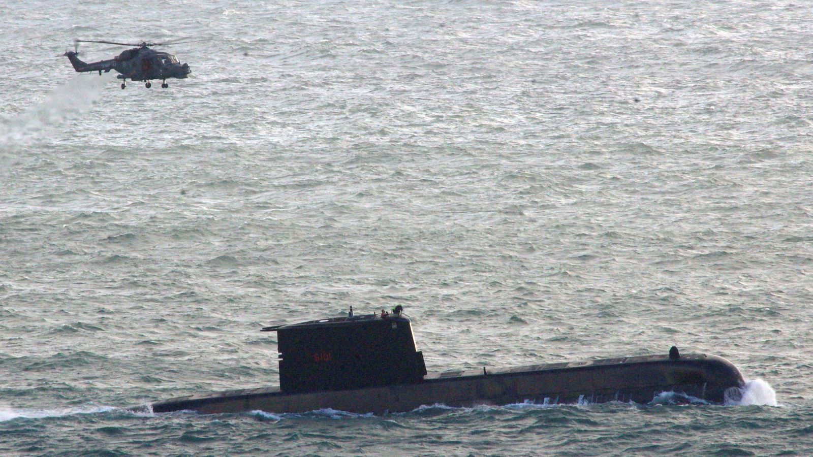 Three South African navy personnel die after being swept off submarine deck by large waves