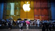 People stand outside an Apple Store as Apple&#39;s new iPhone 15 officially goes on sale across China, in Shanghai, China September 22, 2023. REUTERS/Aly Song
