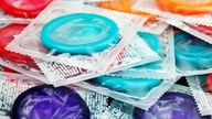 Collection of colorful condomsSelective focus; shallow DOF