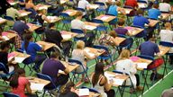 File photo dated 24/05/10 of A-level students sit an A-level maths exam inside a sports hall. Around 300,000 fewer top GCSE grades could be awarded this week in a "shock" to pupils and their parents, it has been suggested. Issue date: Monday August 21, 2023.
