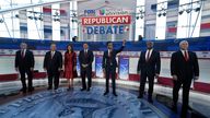 Republican presidential candidates, from left, North Dakota Gov. Doug Burgum, former New Jersey Gov. Chris Christie, former U.N. Ambassador Nikki Haley, Florida Gov. Ron DeSantis, entrepreneur Vivek Ramaswamy, Sen. Tim Scott, R-S.C., and former Vice President Mike Pence, stand together during a Republican presidential primary debate hosted by FOX Business Network and Univision, Wednesday, Sept. 27, 2023, at the Ronald Reagan Presidential Library in Simi Valley, Calif. (AP Photo/Mark J. Terrill)