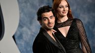 Joe Jonas, left, and Sophie Turner arrive at the Vanity Fair Oscar Party on Sunday, March 12, 2023, at the Wallis Annenberg Center for the Performing Arts in Beverly Hills, Calif. (Photo by Evan Agostini/Invision/AP)