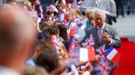 King Charles III speaks to members of the public gathered outside the Hotel de Ville in Bordeaux on day three of the state visit to France. The visit celebrates the strong and historic ties between Bordeaux and the UK. Picture date: Friday September 22, 2023.