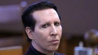 Musical artist Marilyn Manson, whose legal name is Brian Hugh Warner, waits for the judge to arrive in Belknap Superior Court 
Pic:AP
Pic:AP