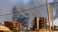 Smoke rises above buildings after an aerial bombardment on the Sudanese capital. File pic