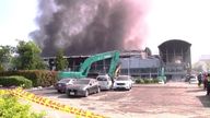Smoke rises from a golfing equipment factory in Pingtung, Taiwan