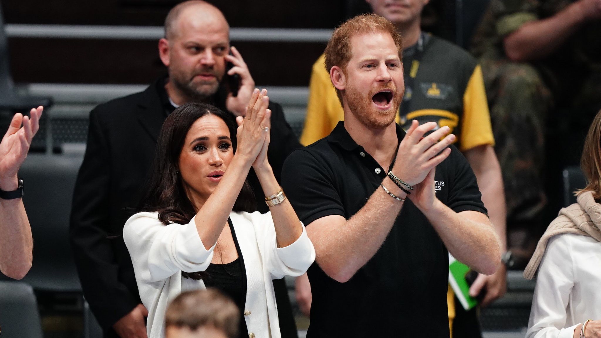 Harry and Meghan cheer from crowd at Invictus Games wheelchair ...