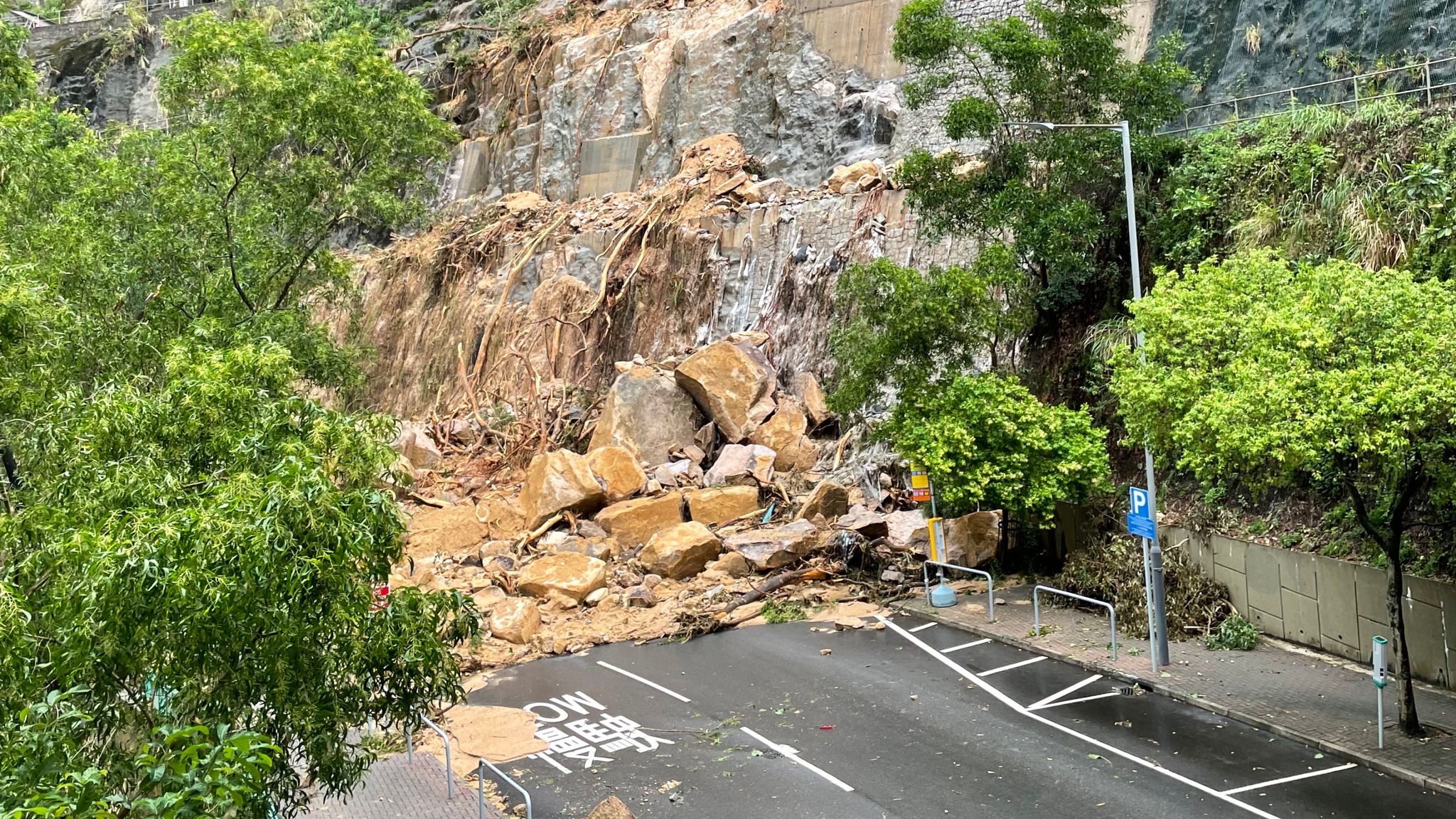 Hong Kong's heaviest rainfall in 140 years leads to landslides with ...