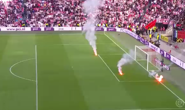 Ajax vs Feyenoord abandoned after flares thrown onto pitch at Johan Cruyff Arena. - Vimarsana News