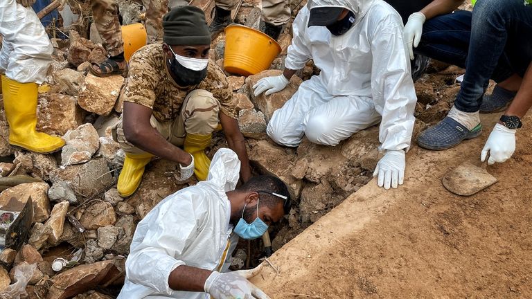 People spent hours digging by hand in the desperate hope of finding survivors 