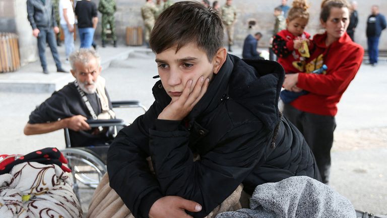 A refugee boy from Nagorno-Karabakh at a temporary accommodation centre in the town of Goris, Armenia