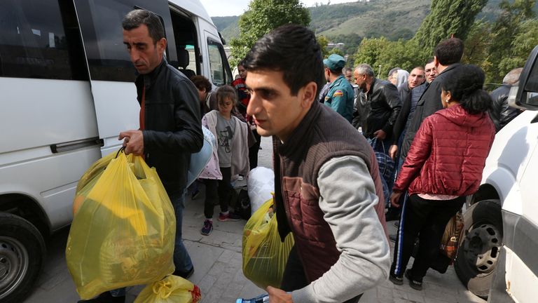 Refugees from Nagorno-Karabakh region arrive at a temporary accommodation centre in the town of Goris, Armenia